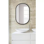 Espejo de pared decorativo enmarcado Caskill Capsule