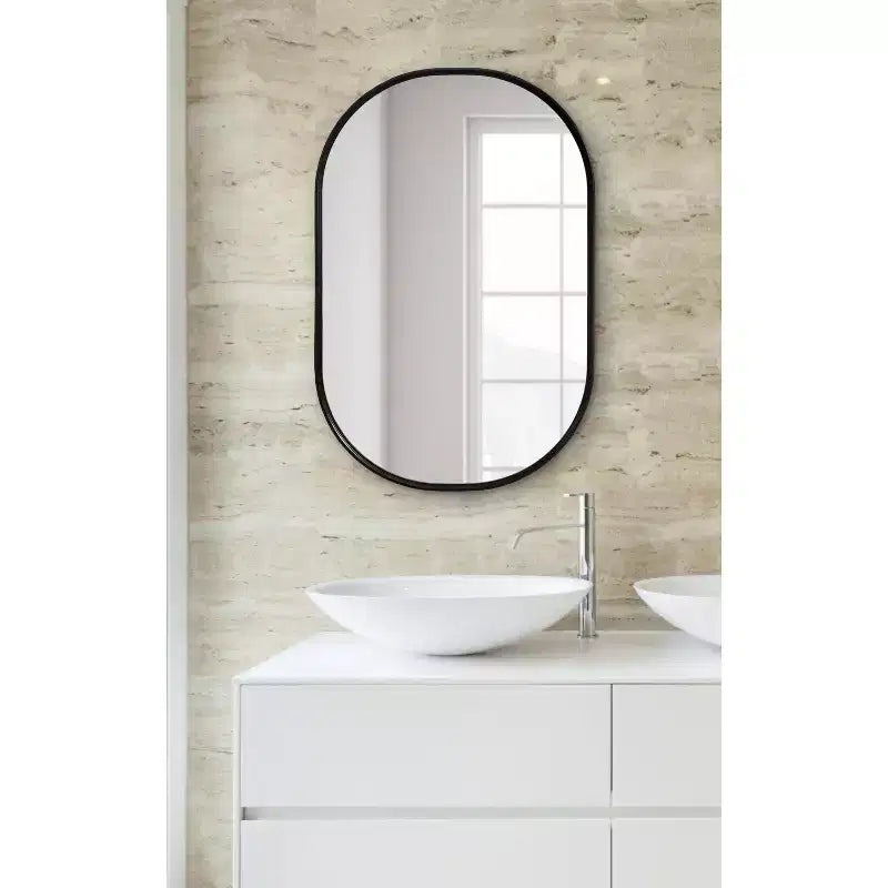 Espejo de pared decorativo enmarcado Caskill Capsule
